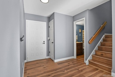 Beautifully updated townhome overlooking the 11th-hole fairway on Golf Club At Heather Ridge in Colorado - for sale on GolfHomes.com, golf home, golf lot