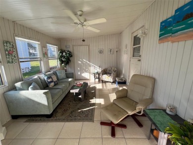 This stunning home, showcasing premium upgrades, is a on Palm Hill Golf Club in Florida - for sale on GolfHomes.com, golf home, golf lot