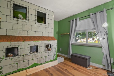 Beautifully updated townhome overlooking the 11th-hole fairway on Golf Club At Heather Ridge in Colorado - for sale on GolfHomes.com, golf home, golf lot