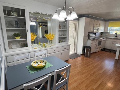 This stunning home, showcasing premium upgrades, is a on Palm Hill Golf Club in Florida - for sale on GolfHomes.com, golf home, golf lot