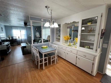 This stunning home, showcasing premium upgrades, is a on Palm Hill Golf Club in Florida - for sale on GolfHomes.com, golf home, golf lot