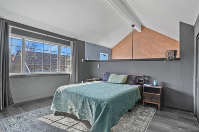 Beautifully updated townhome overlooking the 11th-hole fairway on Golf Club At Heather Ridge in Colorado - for sale on GolfHomes.com, golf home, golf lot