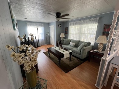 This stunning home, showcasing premium upgrades, is a on Palm Hill Golf Club in Florida - for sale on GolfHomes.com, golf home, golf lot