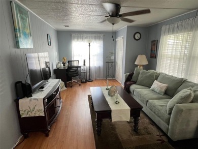 This stunning home, showcasing premium upgrades, is a on Palm Hill Golf Club in Florida - for sale on GolfHomes.com, golf home, golf lot