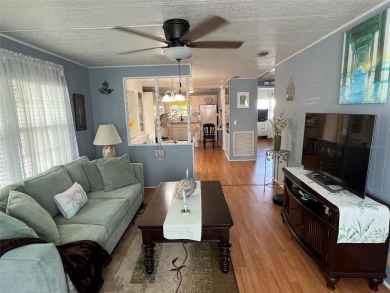 This stunning home, showcasing premium upgrades, is a on Palm Hill Golf Club in Florida - for sale on GolfHomes.com, golf home, golf lot