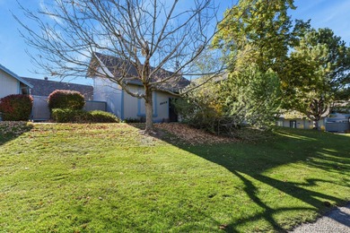Beautifully updated townhome overlooking the 11th-hole fairway on Golf Club At Heather Ridge in Colorado - for sale on GolfHomes.com, golf home, golf lot