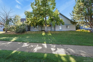 Beautifully updated townhome overlooking the 11th-hole fairway on Golf Club At Heather Ridge in Colorado - for sale on GolfHomes.com, golf home, golf lot