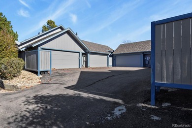 Beautifully updated townhome overlooking the 11th-hole fairway on Golf Club At Heather Ridge in Colorado - for sale on GolfHomes.com, golf home, golf lot