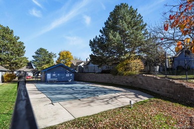 Beautifully updated townhome overlooking the 11th-hole fairway on Golf Club At Heather Ridge in Colorado - for sale on GolfHomes.com, golf home, golf lot