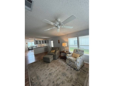 Embrace the coveted resort lifestyle in this charming, updated on Hamptons Golf Club in Florida - for sale on GolfHomes.com, golf home, golf lot