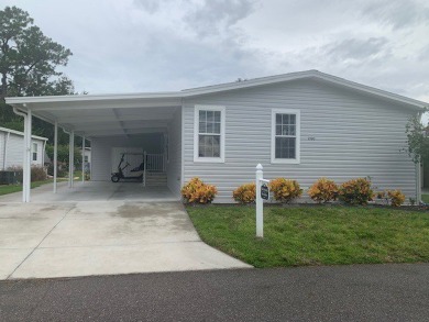 Listed by the Official Sales Team of Cypress Lakes Village on Big Cypress Golf and Country Club in Florida - for sale on GolfHomes.com, golf home, golf lot