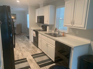 Listed by the Official Sales Team of Cypress Lakes Village on Big Cypress Golf and Country Club in Florida - for sale on GolfHomes.com, golf home, golf lot