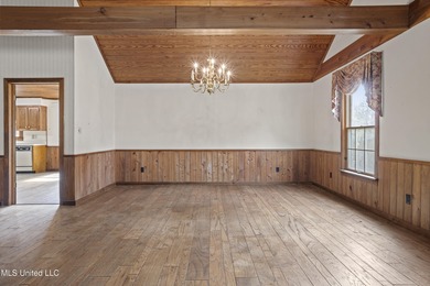 Beautiful Southern style home nestled on a serene 1 1/2 acre on Mississippi National Golf Course in Mississippi - for sale on GolfHomes.com, golf home, golf lot