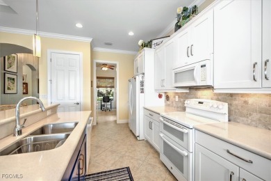 This Florencia floor plan home, located in the desired Carena on Pelican Preserve Golf Club in Florida - for sale on GolfHomes.com, golf home, golf lot