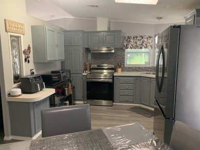Listed by the Official Sales Team of Cypress Lakes Village on Big Cypress Golf and Country Club in Florida - for sale on GolfHomes.com, golf home, golf lot