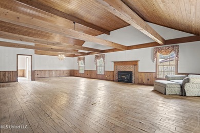 Beautiful Southern style home nestled on a serene 1 1/2 acre on Mississippi National Golf Course in Mississippi - for sale on GolfHomes.com, golf home, golf lot