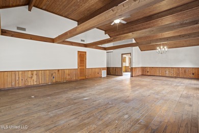 Beautiful Southern style home nestled on a serene 1 1/2 acre on Mississippi National Golf Course in Mississippi - for sale on GolfHomes.com, golf home, golf lot