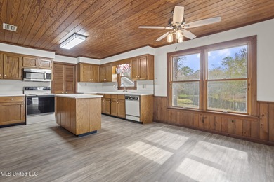 Beautiful Southern style home nestled on a serene 1 1/2 acre on Mississippi National Golf Course in Mississippi - for sale on GolfHomes.com, golf home, golf lot