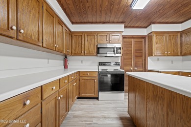 Beautiful Southern style home nestled on a serene 1 1/2 acre on Mississippi National Golf Course in Mississippi - for sale on GolfHomes.com, golf home, golf lot