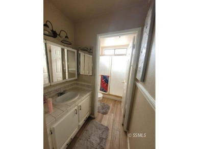 Large and spacious home with 3 BR/ 2 Ba, office, indoor laundry on Tierra Del Sol Golf Course in California - for sale on GolfHomes.com, golf home, golf lot