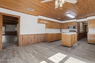 Beautiful Southern style home nestled on a serene 1 1/2 acre on Mississippi National Golf Course in Mississippi - for sale on GolfHomes.com, golf home, golf lot