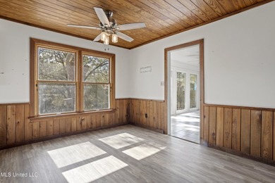 Beautiful Southern style home nestled on a serene 1 1/2 acre on Mississippi National Golf Course in Mississippi - for sale on GolfHomes.com, golf home, golf lot