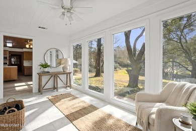 Beautiful Southern style home nestled on a serene 1 1/2 acre on Mississippi National Golf Course in Mississippi - for sale on GolfHomes.com, golf home, golf lot