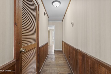 Beautiful Southern style home nestled on a serene 1 1/2 acre on Mississippi National Golf Course in Mississippi - for sale on GolfHomes.com, golf home, golf lot