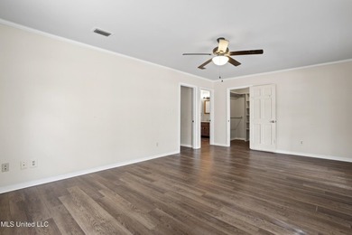 Beautiful Southern style home nestled on a serene 1 1/2 acre on Mississippi National Golf Course in Mississippi - for sale on GolfHomes.com, golf home, golf lot