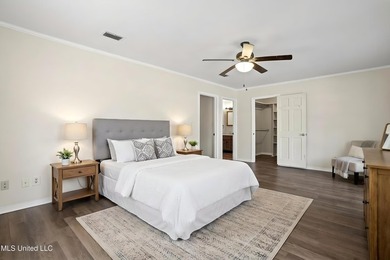 Beautiful Southern style home nestled on a serene 1 1/2 acre on Mississippi National Golf Course in Mississippi - for sale on GolfHomes.com, golf home, golf lot