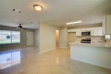 This well-maintained 3-bedroom, 2-bath home offers a functional on Heron Creek Golf and Country Club in Florida - for sale on GolfHomes.com, golf home, golf lot