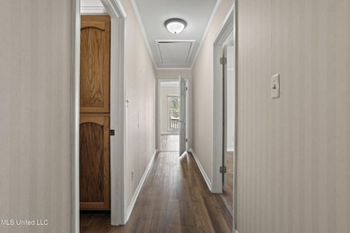 Beautiful Southern style home nestled on a serene 1 1/2 acre on Mississippi National Golf Course in Mississippi - for sale on GolfHomes.com, golf home, golf lot