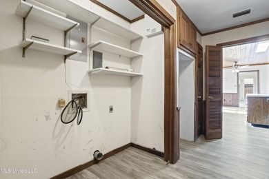 Beautiful Southern style home nestled on a serene 1 1/2 acre on Mississippi National Golf Course in Mississippi - for sale on GolfHomes.com, golf home, golf lot