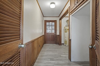 Beautiful Southern style home nestled on a serene 1 1/2 acre on Mississippi National Golf Course in Mississippi - for sale on GolfHomes.com, golf home, golf lot