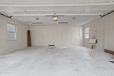 Beautiful Southern style home nestled on a serene 1 1/2 acre on Mississippi National Golf Course in Mississippi - for sale on GolfHomes.com, golf home, golf lot