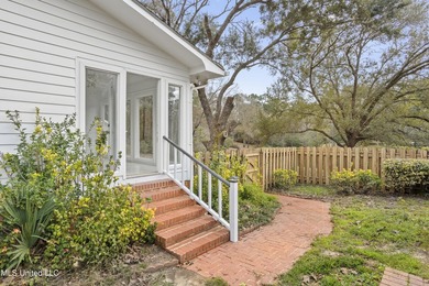 Beautiful Southern style home nestled on a serene 1 1/2 acre on Mississippi National Golf Course in Mississippi - for sale on GolfHomes.com, golf home, golf lot
