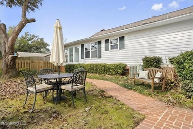 Beautiful Southern style home nestled on a serene 1 1/2 acre on Mississippi National Golf Course in Mississippi - for sale on GolfHomes.com, golf home, golf lot