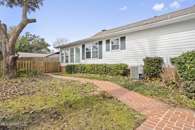 Beautiful Southern style home nestled on a serene 1 1/2 acre on Mississippi National Golf Course in Mississippi - for sale on GolfHomes.com, golf home, golf lot