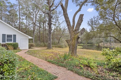 Beautiful Southern style home nestled on a serene 1 1/2 acre on Mississippi National Golf Course in Mississippi - for sale on GolfHomes.com, golf home, golf lot