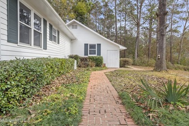 Beautiful Southern style home nestled on a serene 1 1/2 acre on Mississippi National Golf Course in Mississippi - for sale on GolfHomes.com, golf home, golf lot