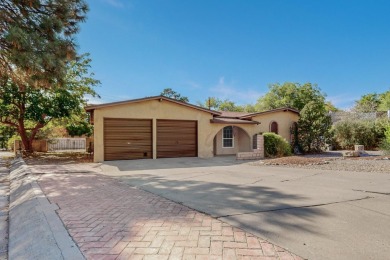 This Fantastic home offers an open concept floorplan on a rare on Arroyo Del Oso Golf Course in New Mexico - for sale on GolfHomes.com, golf home, golf lot