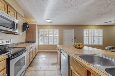 This Fantastic home offers an open concept floorplan on a rare on Arroyo Del Oso Golf Course in New Mexico - for sale on GolfHomes.com, golf home, golf lot