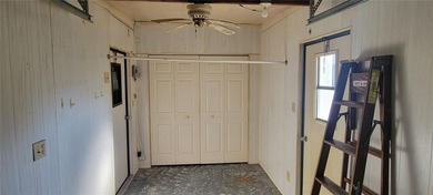 Welcome home to this charming 940 sq. ft., 2-bedroom, 1-bath on Orange Blossom Hills Golf and Country Club in Florida - for sale on GolfHomes.com, golf home, golf lot