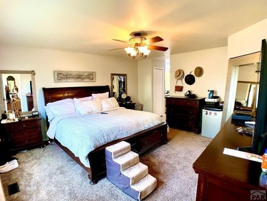 Welcome to this beautifully maintained 4-bedroom, 3-bathroom on Desert Hawk At Pueblo West in Colorado - for sale on GolfHomes.com, golf home, golf lot