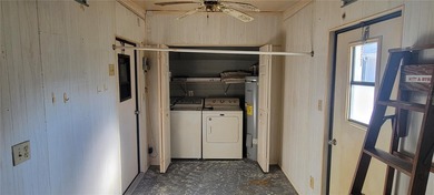 Welcome home to this charming 940 sq. ft., 2-bedroom, 1-bath on Orange Blossom Hills Golf and Country Club in Florida - for sale on GolfHomes.com, golf home, golf lot