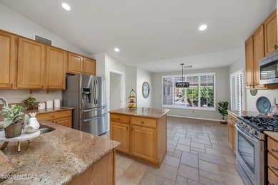 Set on a prime corner lot, this beautifully maintained Laredo on Saddlebrooke Golf Course in Arizona - for sale on GolfHomes.com, golf home, golf lot