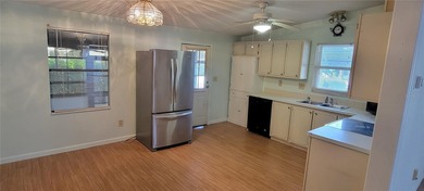 Welcome home to this charming 940 sq. ft., 2-bedroom, 1-bath on Orange Blossom Hills Golf and Country Club in Florida - for sale on GolfHomes.com, golf home, golf lot