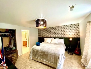 Welcome to this beautifully maintained 4-bedroom, 3-bathroom on Desert Hawk At Pueblo West in Colorado - for sale on GolfHomes.com, golf home, golf lot