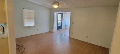 Welcome home to this charming 940 sq. ft., 2-bedroom, 1-bath on Orange Blossom Hills Golf and Country Club in Florida - for sale on GolfHomes.com, golf home, golf lot