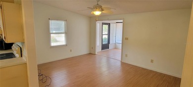 Welcome home to this charming 940 sq. ft., 2-bedroom, 1-bath on Orange Blossom Hills Golf and Country Club in Florida - for sale on GolfHomes.com, golf home, golf lot